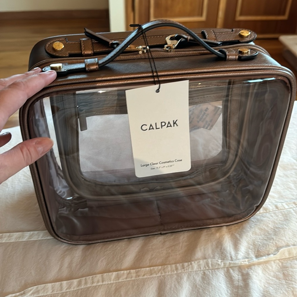 NWT Calpak Large Clear Cosmetics Case in Bronze